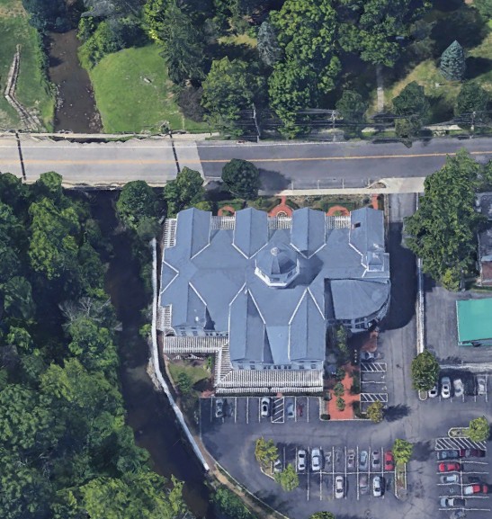 Satellite aerial view of a commercial roof for AI-powered takeoff estimation